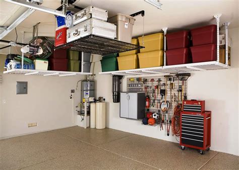 How about creating a suspended, sliding storage system where you could keep all your tools and other goodies? Garage Overhead Storage Diy Wood — Schmidt Gallery Design