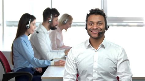 Cheerful Indian Call Center Worker Showing Stock Footage SBV Storyblocks