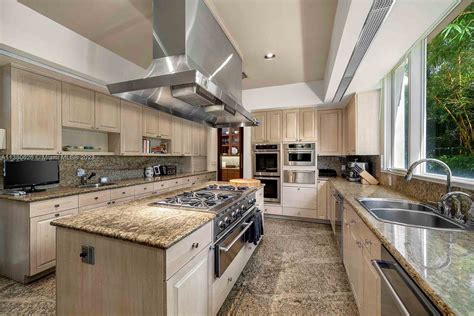 Every Day He's Hustlin' - Inside Rick Ross's New Star Island Waterfront