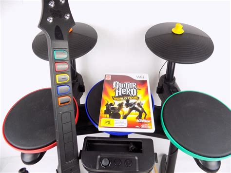 Nintendo Wii Guitar Hero Rock Band Bundle Drum Guitar Mic World