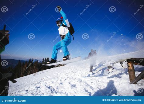 Jumping Snowboarder On Blue Sky Background Stock Image Image Of