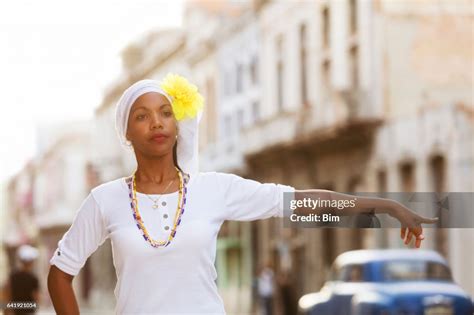 Beautiful Young Cuban Woman Calling Taxi In Havana Cuba High Res Stock