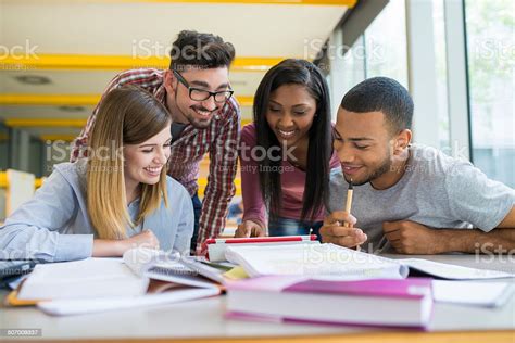 Students Helping Each Other Stock Photo Download Image Now High