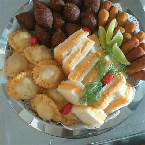 A Platter Filled With Different Types Of Snacks