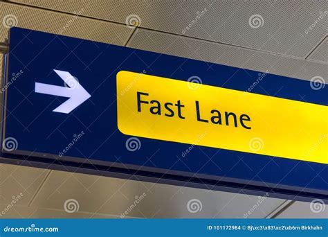 Fast Lane Sign In Blue And Yellow At The Airport Stock Photo Image Of