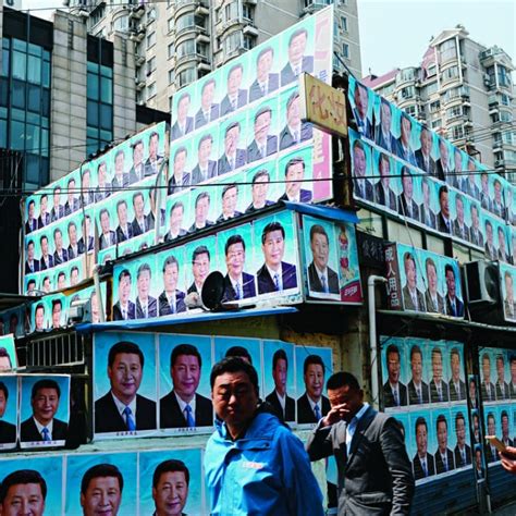 Posters Of Chinas President Xi Jinping Put Stop To Bulldozers For