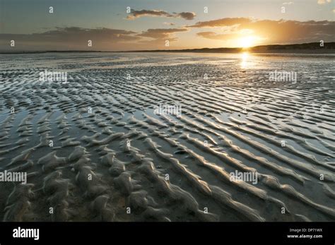 View Of Ripples In Sand On Beach During Low Tide At Sunset Camber