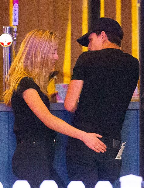 Tom Holland Gets Butt Grabbed By Mystery Blonde During London Festival