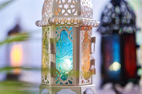 Premium Photo Ornamental Arabic Lantern With Burning Candle Glowing