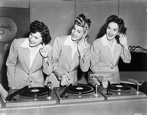The Andrews Sisters Listening To Their Record Circa 1944 Andrews