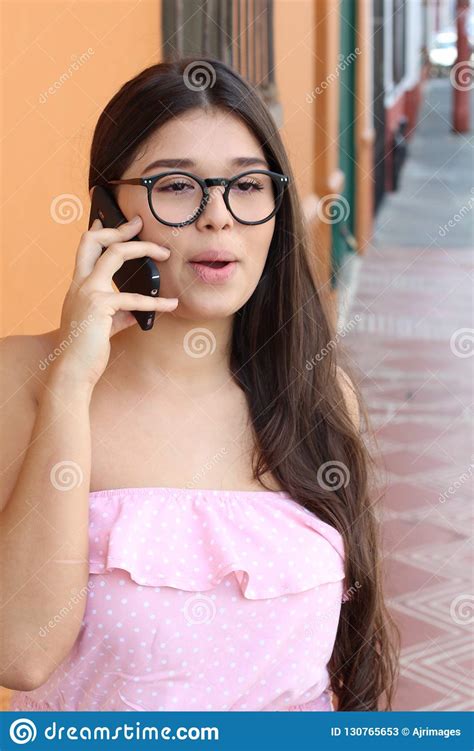 Young Girl Gossiping During Phone Call Stock Image Image Of Latina Opsy 130765653