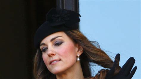 Kate Caught Smiling And Twirling Her Hair At Sombre Veterans Ceremony