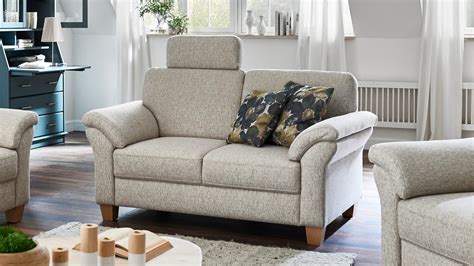 Bei einer polstergarnitur können zu einem sofa unterschiedliche sesselmodelle, wie ohrensessel oder lehnsessel, kombiniert werden. Sofa BORKUM 2-Sitzer in Stoff natur mit Federkern 156 cm ...