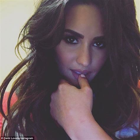 Demi Lovato Wears Mesh Bodysuit And Thigh High Boots Daily Mail Online
