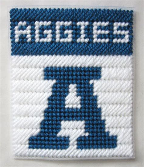 Very well made and good quality. Utah State Aggies tissue box cover in plastic canvas ...