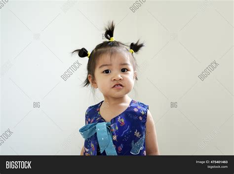 Little Asian Girl Blue Image And Photo Free Trial Bigstock