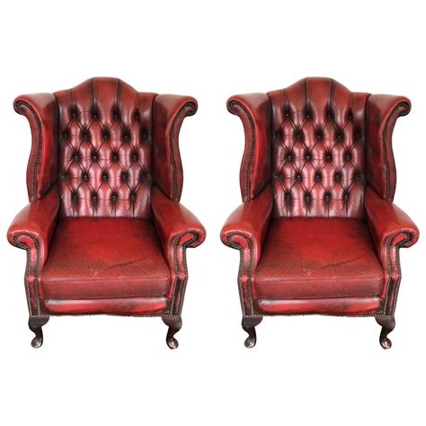 Check out our red leather chairs selection for the very best in unique or custom, handmade pieces from our мебель shops. Pair of Hand Dyed Red Leather Wingback Chairs For Sale at ...