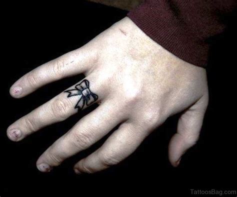35 Cute Bow Tattoos On Finger Tattoo Designs