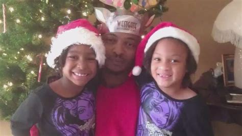 Phoenix Shooting Victim Rumain Brisbon Is Shown With His Daughters In