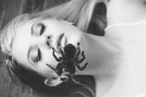 Tarantula Crawling On Womans Face Del Colaborador De Stocksy Jen