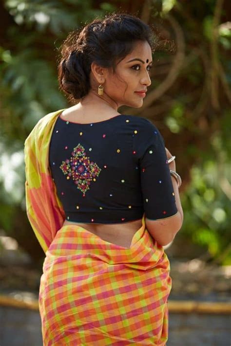 The blouse being heavily embellished does not require and extra designs or pattern on it, making the latkans a very good option for trending it up. Latest trend of blouse designs for lehenga and saree ...