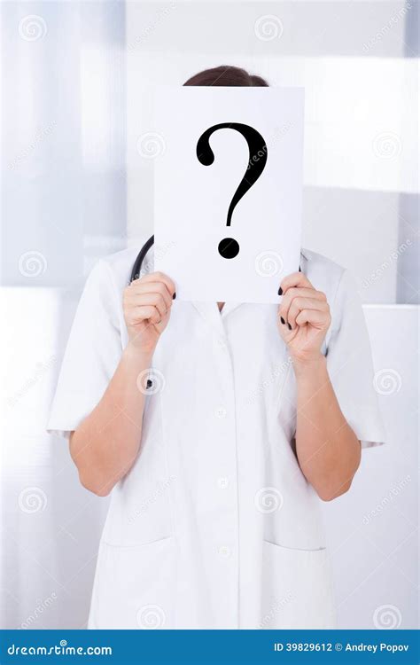 Doctor Holding Question Mark Sign In Hospital Stock Photo Image Of