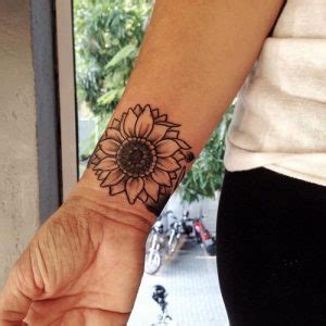 Download this free vector about vintage sunflower in black and white, and discover more than 12 million professional graphic resources on freepik. Sunflower Wrist Tattoo Designs, Ideas and Meaning ...