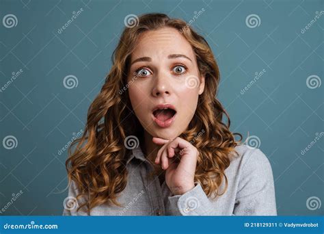 Shocked Beautiful Girl Expressing Surprise And Looking At Camera Stock Image Image Of Blue