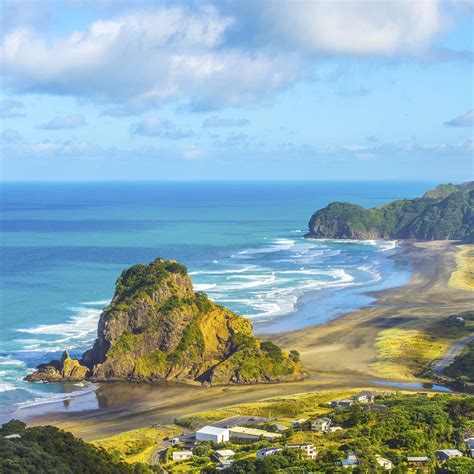 Piha Beach Auckland New Zealand Dmitryserbinshutterstockcom