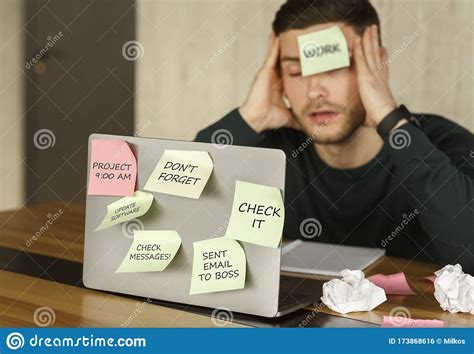 Sleepy Manager Guy Having Sticky Notes Everywhere At Workplace Indoor Stock Photo Image Of