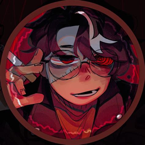 An Anime Character With Red Eyes And Dark Hair In A Circular Frame