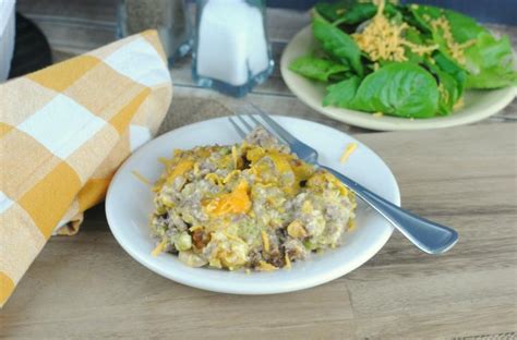 A dark purple plate with a wooden handled fork sitting next. Cheesy Hamburger and Broccoli Casserole {Keto} - MyFreezEasy