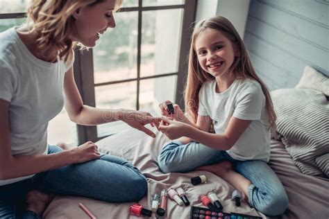 mom with daughter doing makeup stock image image of manicure makeup 99353307
