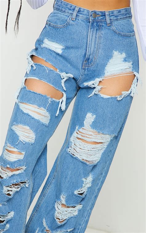 Mid Blue Wash Distressed Baggy Boyfriend Jeans Prettylittlething