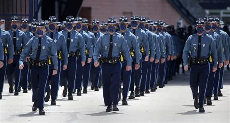 Shoulder To Shoulder 6 Feet Apart Baker Swears In New Mass State Police Troopers Wbur News