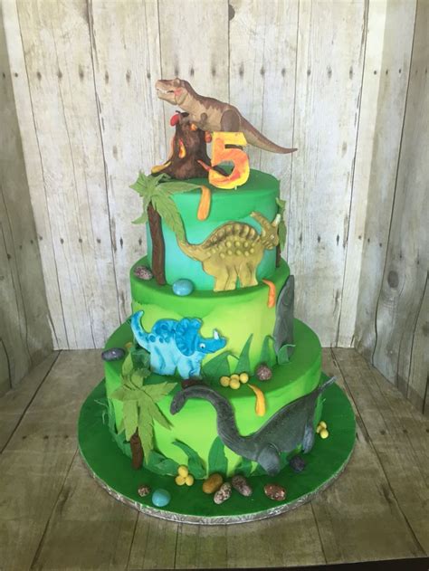 Dinosaurs are extinct but delicious cakes aren't. Dinosaurs cake in 2020 | Dinosaur birthday party, Dinosaur ...