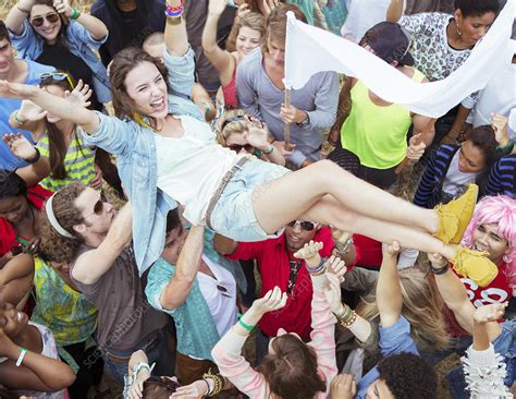 Woman Crowd Surfing At Music Festival Stock Image F0138908