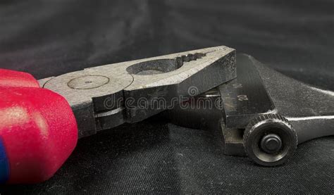 Plier With Red Handle Resting On A Spanner Stock Image Image Of Steel