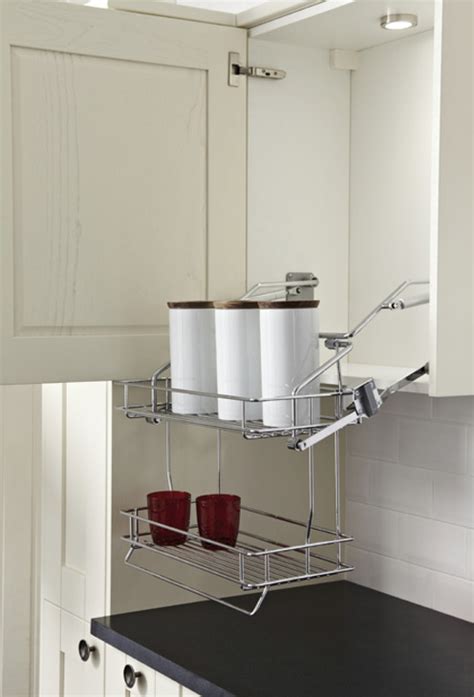 Keep cookbooks, tablets, knives, phones, or note and message racks at eye level, up and out of work space and spills. Pull Down Two Tier Kitchen Wire Shelf