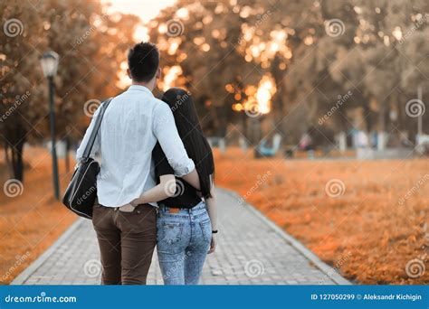 Young Couple On A Walk In Autumn Park Stock Image Image Of Love