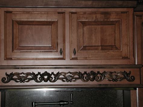 Crown molding is a design feature dating back to greek and roman architecture. Maple Stained Cabinets With a Darker Crown Molding ...