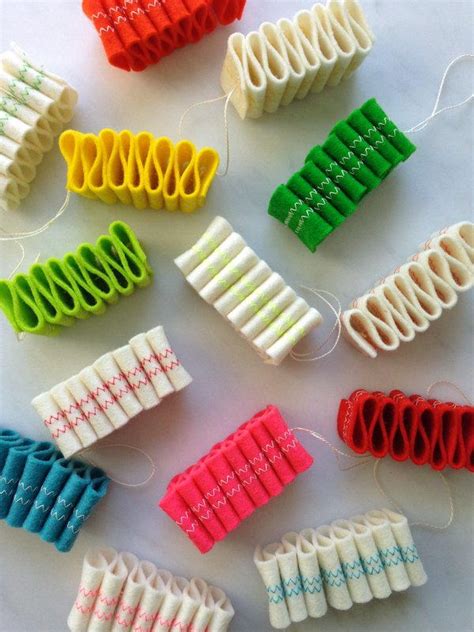 From candy bowls to sugary mermaid tails, take your crafting to the kitchen with this list of fun and creative candy crafts. Felt Ribbon Candy Ornaments | AllFreeSewing.com