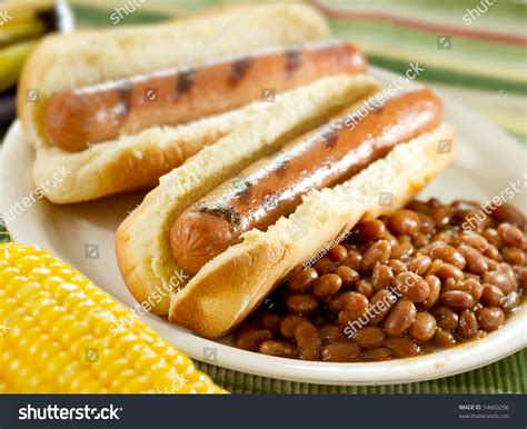 Serve these dogs at your next cookout, game day feast, or weeknight dinner. Hot Dogs And Baked Beans Stock Photo 54660256 : Shutterstock