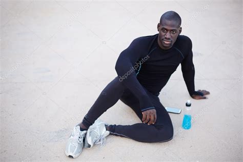 Smiling Dark Skinned Runner Resting After Workout Outdoorsmale Runner