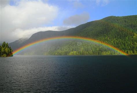 Rainbow Over The Lake Stock Photo Image Of Lake Paradise 110143378