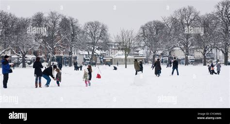 People Enjoying The Snow On Twickenham Greenlondon Borough Of Richmond