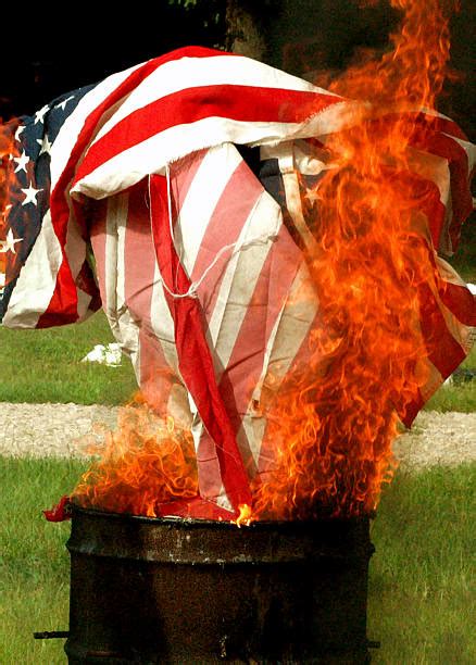 Best American Flag Burning Stock Photos Pictures And Royalty Free Images