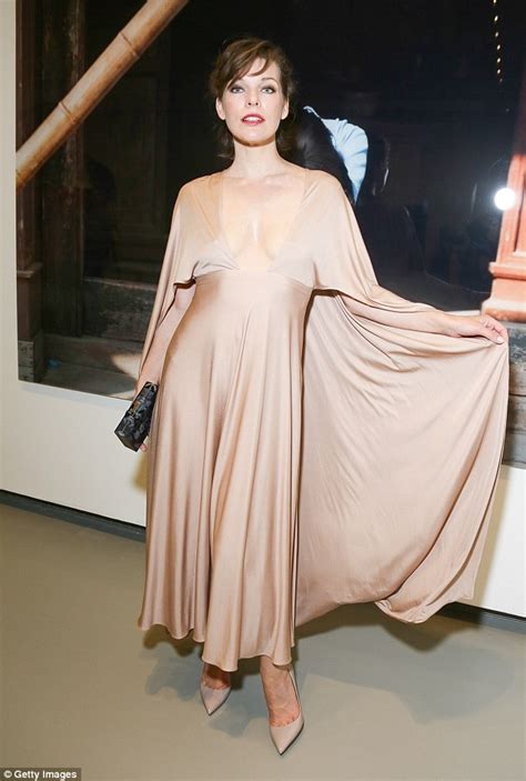 Milla Jovovich Wears Dress With Plunging Neckline At The Love Ball Gala