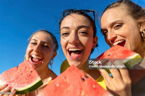 Close Up Pov Portrait Of Three Happy Girls Eating Watermelon At The