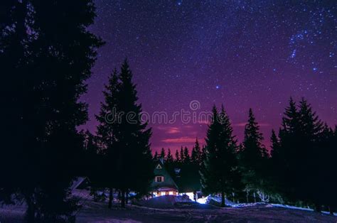 Milky Way Galaxy Purple Night Sky Stars Above Mountains Stock Photo